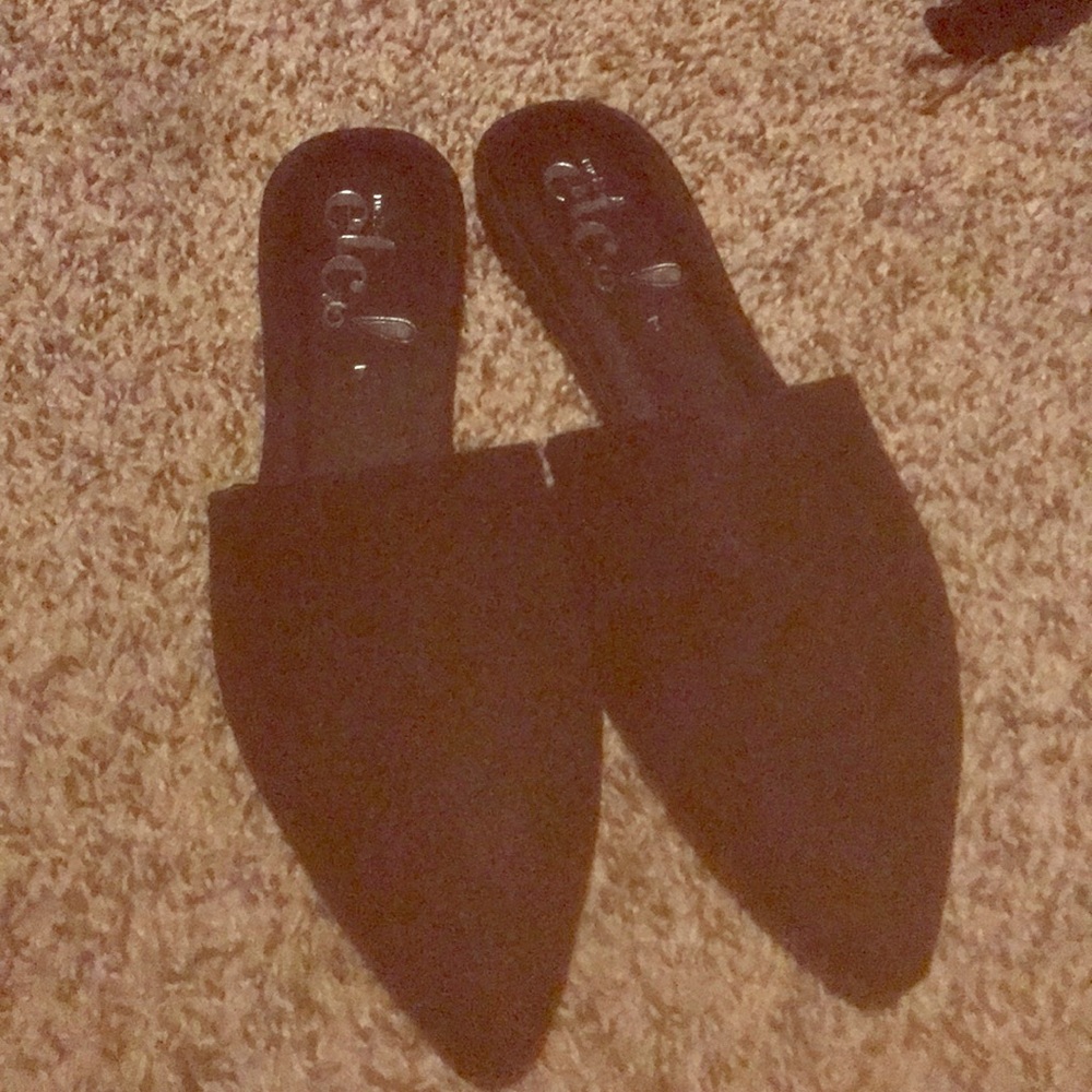 Never worn black pointy toe flat mule